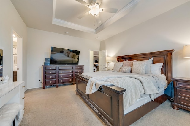 124 Feverbush Dr, Fate, TX 75189 - bedroom with ornamental molding, light colored carpet, a tray ceiling, and a ceiling fan