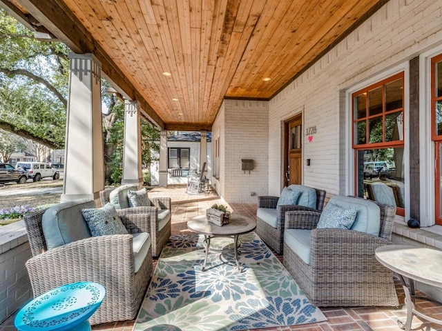 view of patio / terrace with an outdoor living space and covered porch