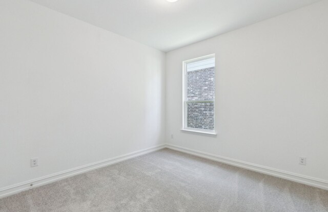 5917 Mayer Ave, Pilot Point, TX 75009 - spare room with carpet floors and baseboards