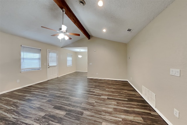 interior space with visible vents, dark wood-style flooring, and a textured ceiling