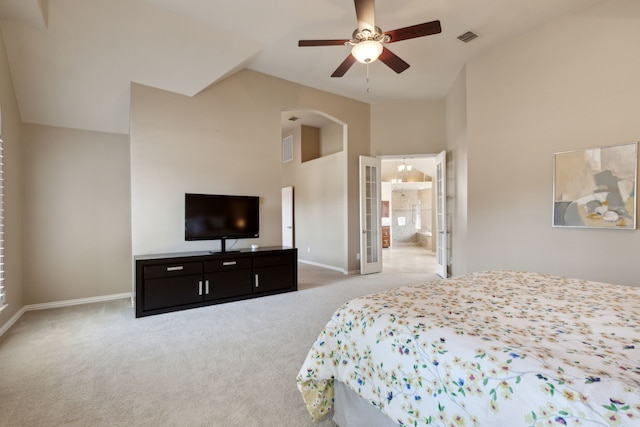 bedroom featuring visible vents, baseboards, vaulted ceiling, carpet floors, and french doors