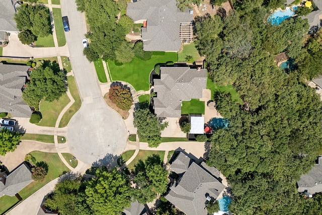 birds eye view of property with a residential view