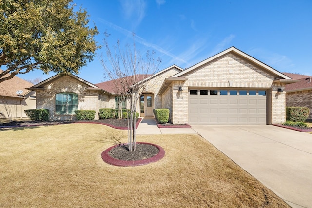 ranch-style house with driveway, a front lawn, an attached garage, and brick siding