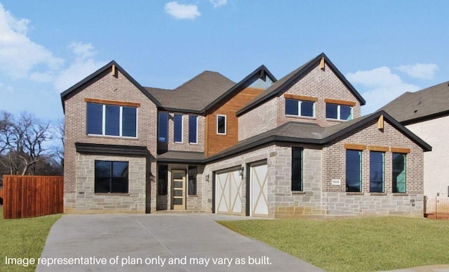 view of front of home featuring a garage, fence, stone siding, concrete driveway, and a front yard