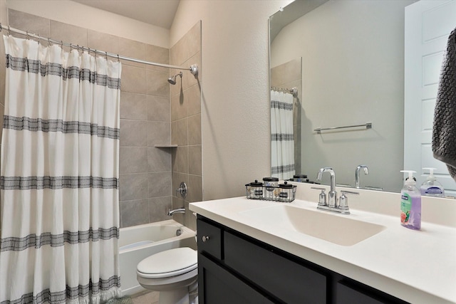 full bath with toilet, shower / bath combo with shower curtain, and vanity