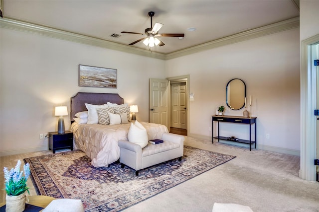 bedroom with carpet floors, baseboards, visible vents, and ornamental molding