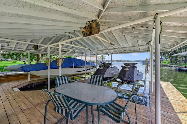 dock area featuring a water view and boat lift