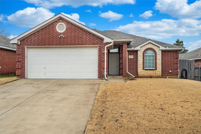 ranch-style home with an attached garage, brick siding, a shingled roof, concrete driveway, and a front yard