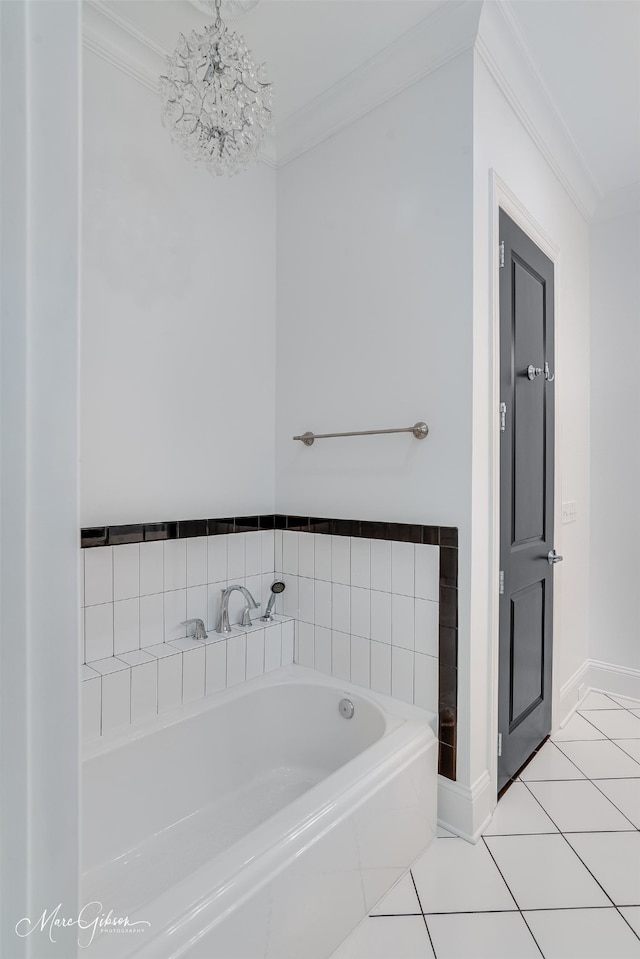 bathroom with a chandelier, tile patterned floors, a bath, and crown molding