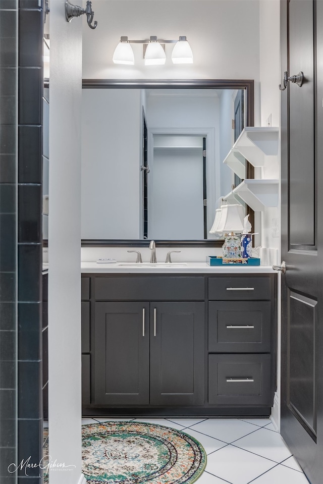 bathroom featuring tile patterned floors and vanity