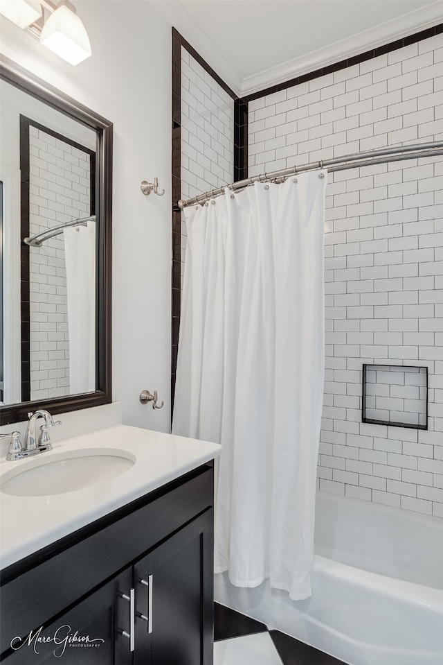 bathroom featuring ornamental molding, shower / bathtub combination with curtain, and vanity