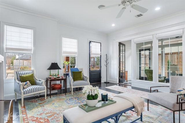 sitting room featuring recessed lighting, baseboards, visible vents, and ornamental molding