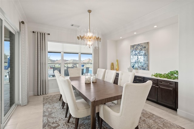 dining area featuring baseboards, visible vents, ornamental molding, a notable chandelier, and recessed lighting