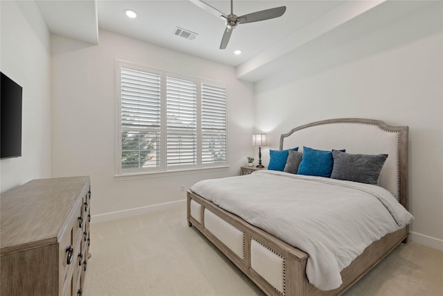 bedroom with recessed lighting, visible vents, light carpet, and baseboards