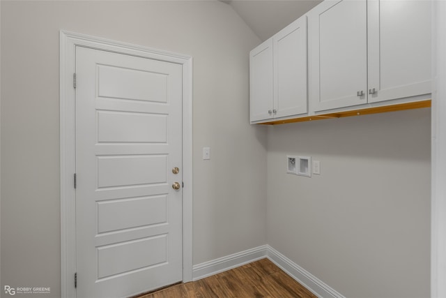 laundry area with cabinet space, hookup for a washing machine, baseboards, and dark wood-type flooring