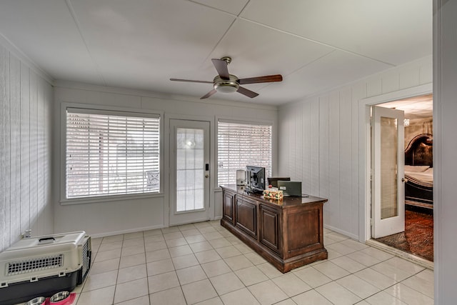 office area with ceiling fan, light tile patterned floors, crown molding, and baseboards