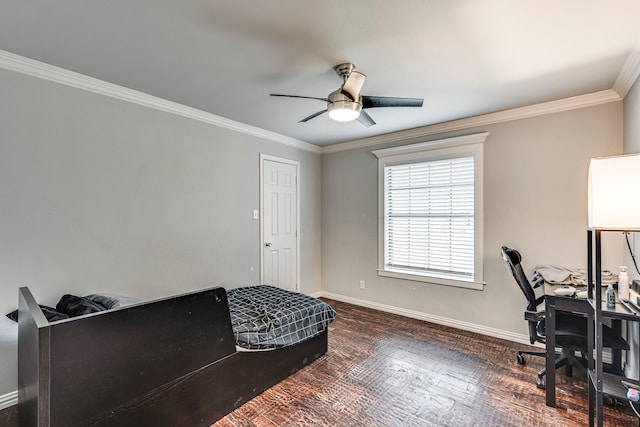 office featuring ornamental molding, dark wood-type flooring, ceiling fan, and baseboards