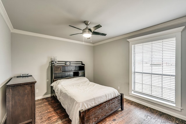 bedroom featuring dark wood-style floors, baseboards, ornamental molding, and a ceiling fan