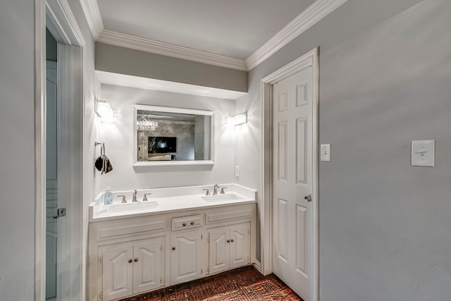 bathroom with crown molding, a sink, and double vanity