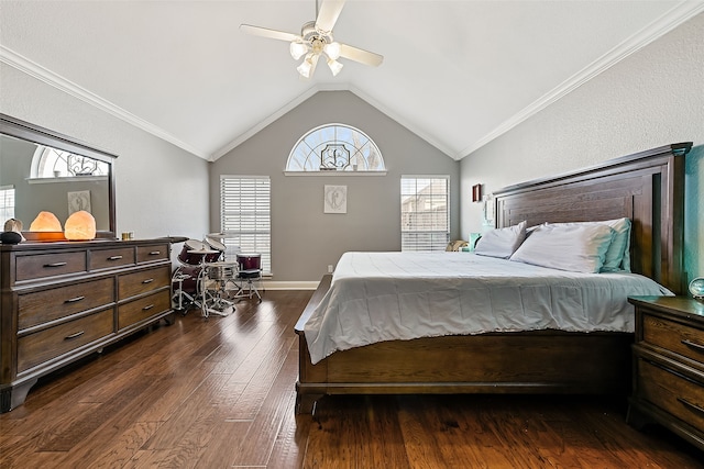 bedroom with dark wood-style floors, ornamental molding, vaulted ceiling, and a ceiling fan