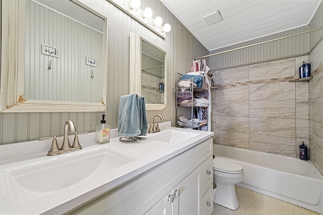 bathroom with toilet, shower / bath combination with curtain, double vanity, and a sink