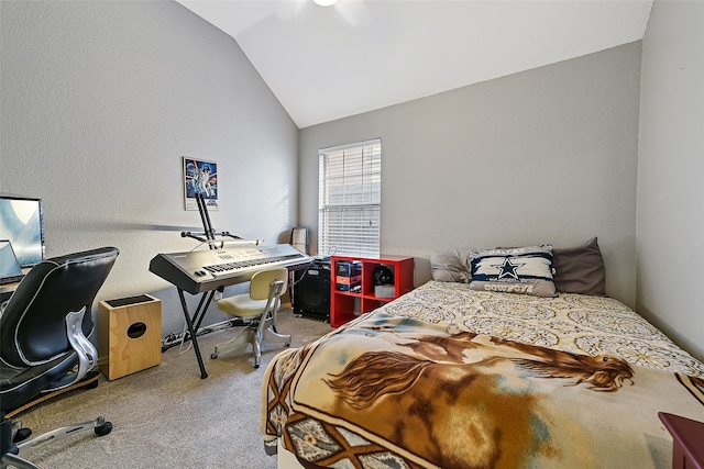 carpeted bedroom with vaulted ceiling