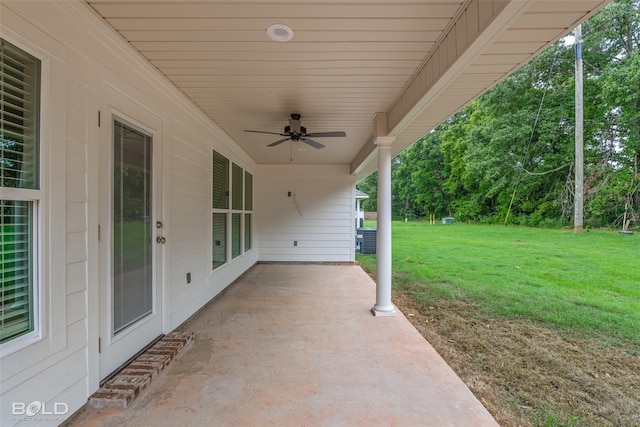 view of patio featuring ceiling fan