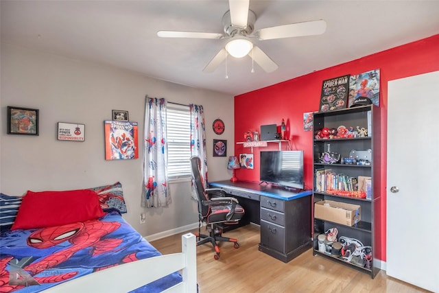 bedroom with baseboards, ceiling fan, and light wood finished floors