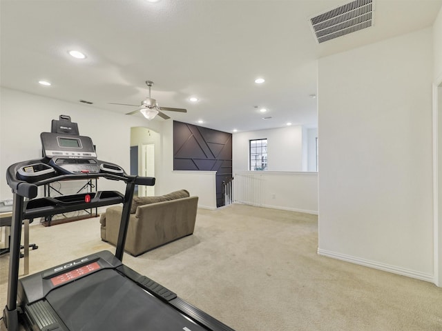 exercise area featuring recessed lighting, light carpet, a ceiling fan, baseboards, and visible vents