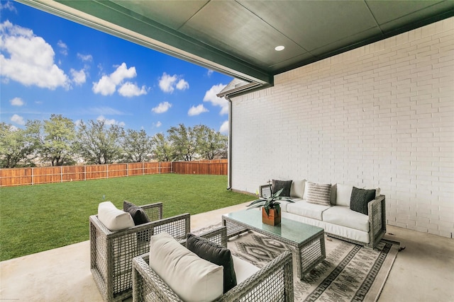 view of patio / terrace featuring a fenced backyard and an outdoor living space