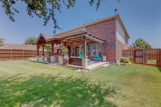 back of property featuring a patio, brick siding, outdoor lounge area, and a fenced backyard