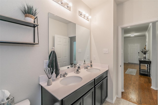 537 Running Water Trl, Fort Worth, TX 76131 - bathroom with double vanity and wood finished floors