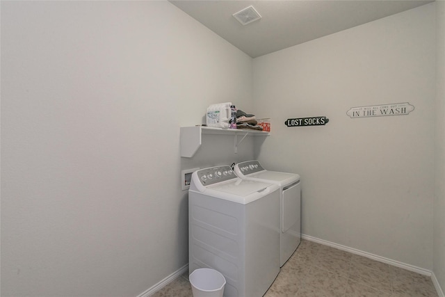 537 Running Water Trl, Fort Worth, TX 76131 - laundry area with washing machine and dryer and baseboards