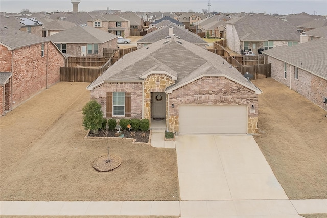 537 Running Water Trl, Fort Worth, TX 76131 - french country style house with a residential view, brick siding, an attached garage, a shingled roof, and concrete driveway