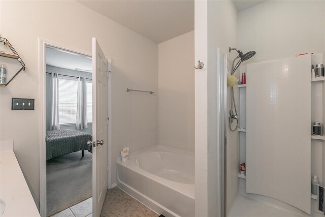 537 Running Water Trl, Fort Worth, TX 76131 - full bathroom with a bath, ensuite bathroom, a shower, and tile patterned floors