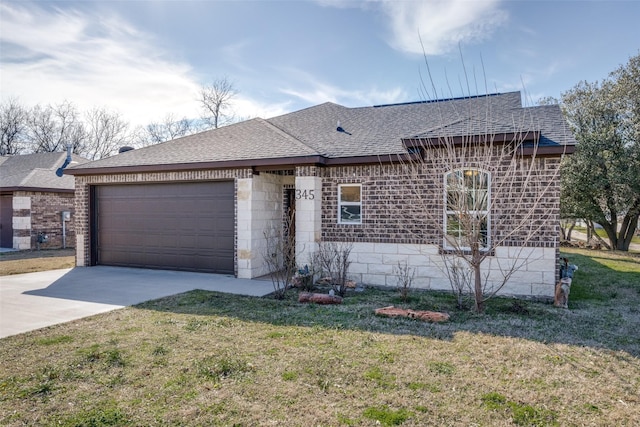 view of front facade featuring a front lawn, concrete driveway, roof with shingles, and an attached garage