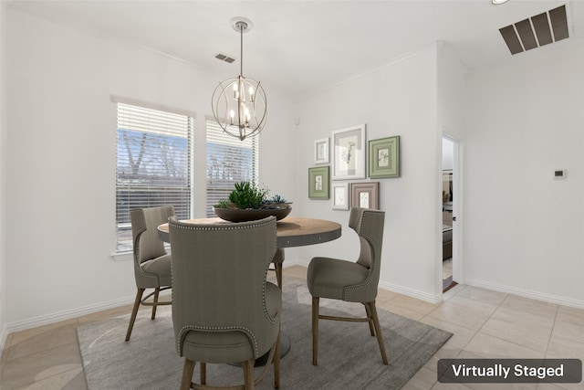 dining space with baseboards, visible vents, a notable chandelier, and light tile patterned flooring