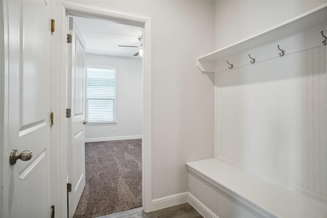 mudroom with carpet and baseboards