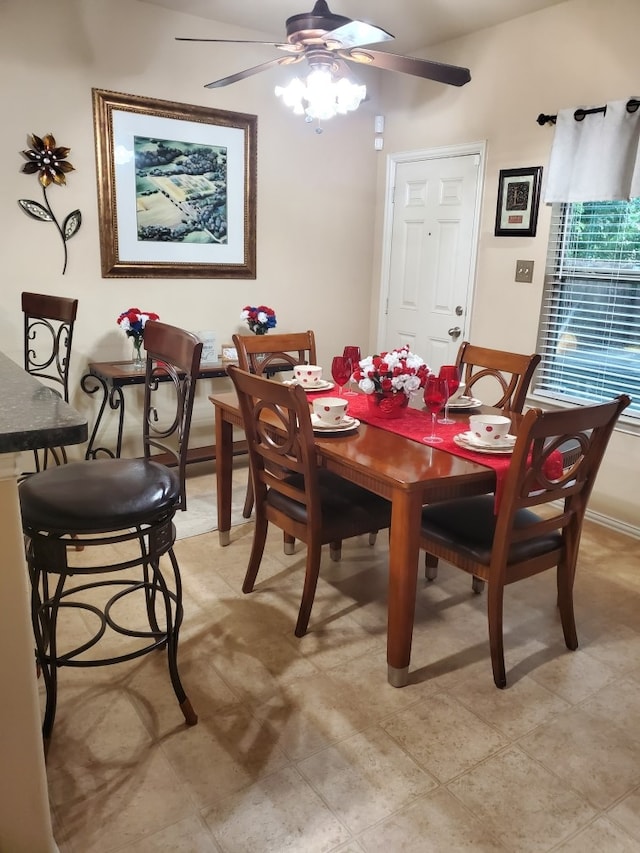 dining space with a ceiling fan