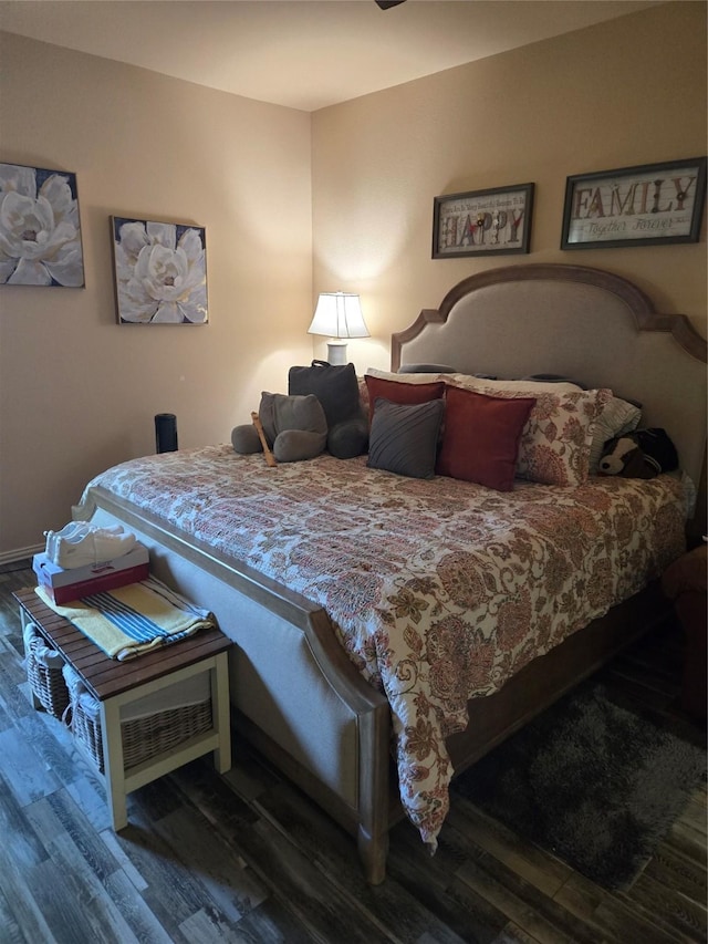 bedroom featuring wood finished floors