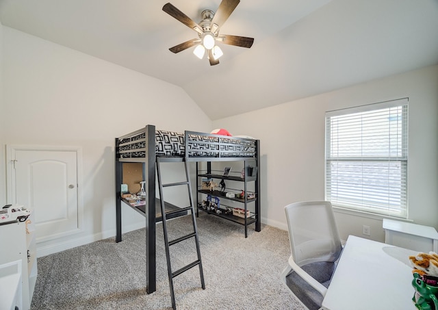 carpeted bedroom with lofted ceiling, ceiling fan, and baseboards