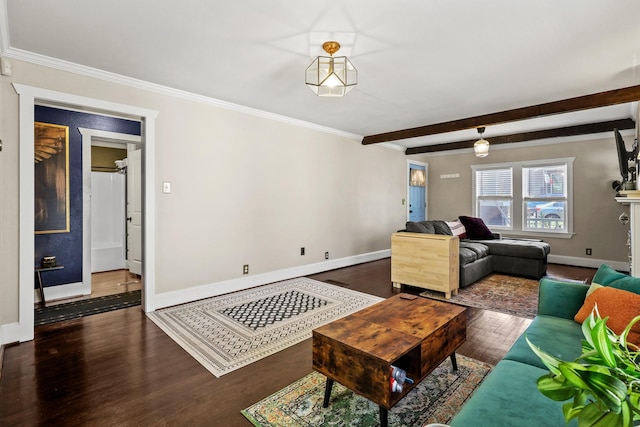 living area with baseboards, dark wood finished floors, beamed ceiling, and ornamental molding