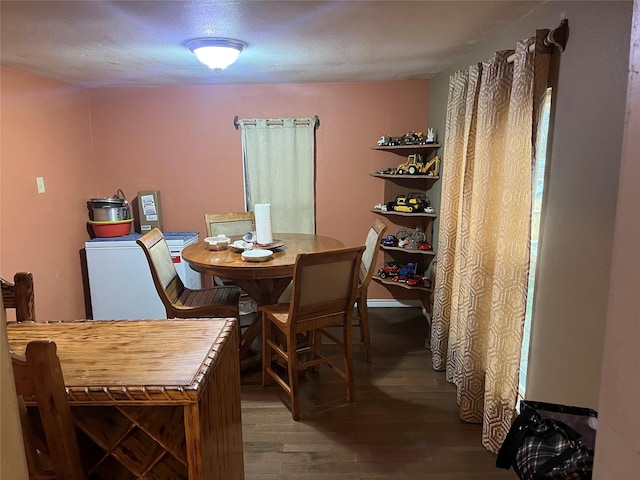 dining room with wood finished floors