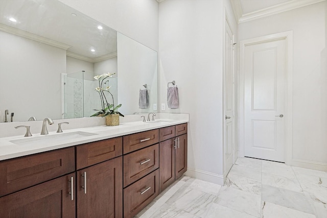 full bathroom with double vanity, a stall shower, crown molding, and a sink