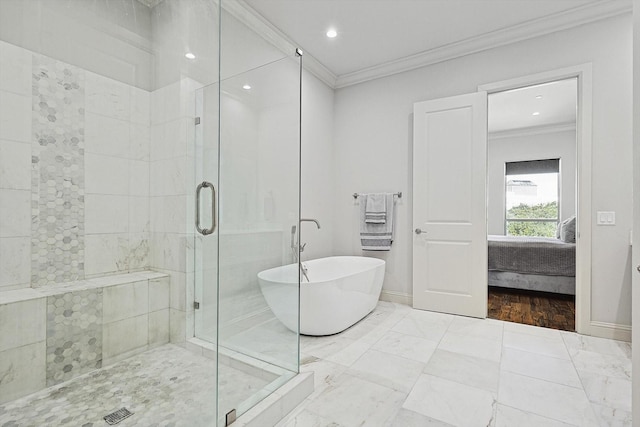 ensuite bathroom featuring a stall shower, ornamental molding, a freestanding tub, and connected bathroom