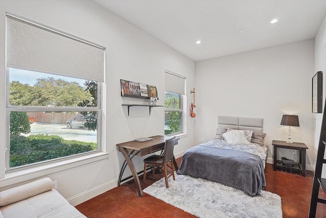 bedroom featuring recessed lighting and baseboards