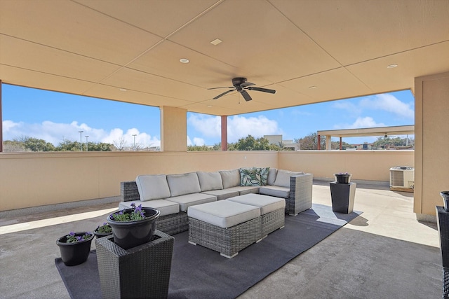 view of patio / terrace with a ceiling fan, cooling unit, and outdoor lounge area