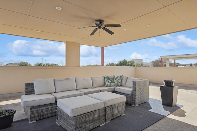 view of patio with ceiling fan and outdoor lounge area