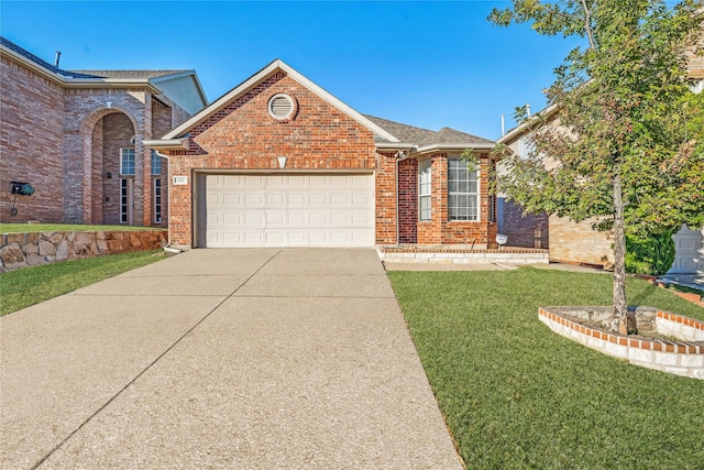 single story home featuring a garage, a front yard, concrete driveway, and brick siding