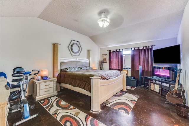 bedroom featuring a ceiling fan, lofted ceiling, concrete floors, and a textured ceiling